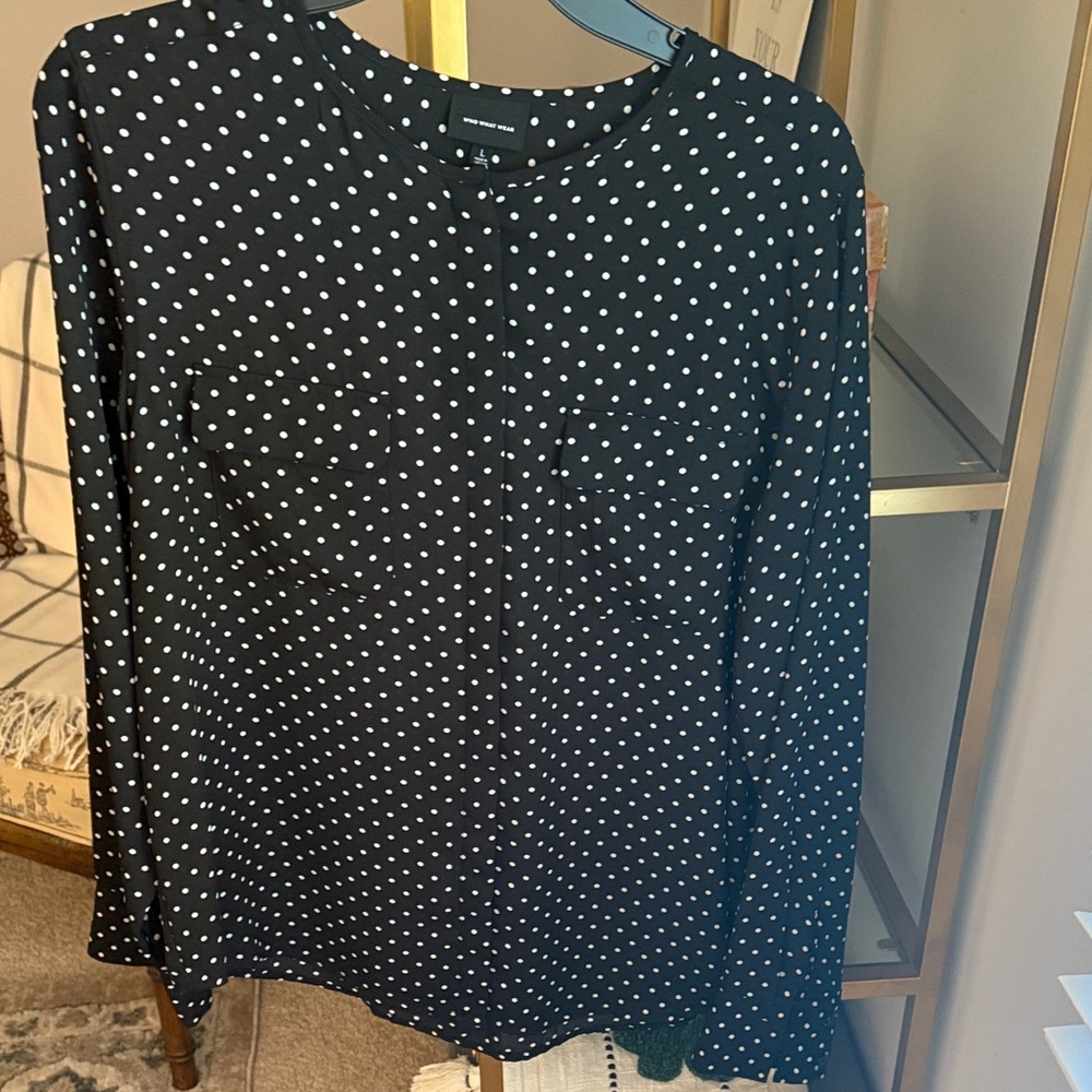 Black and white polkadot blouse
